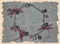 bracciale con perle e cristalli swarovski e accessori in metallo